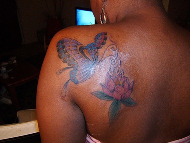 butterfly flower tattoo design, black woman tattoo
