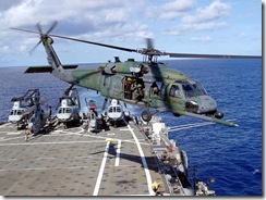 A 33rd Rescue Squadron HH-60G takes off from the USS Juneau during ship landing training in the Pacific.  The primary mission of the HH-60G Pave Hawk helicopter is to conduct day or night operations into hostile environments to recover downed aircrew or other isolated personnel during war. Because of its versatility, the HH-60G is also tasked to perform military operations other than war. These tasks include civil search and rescue, emergency aeromedical evacuation (MEDEVAC), disaster relief, international aid, counterdrug activities and NASA space shuttle support. (U.S. Navy photo)
