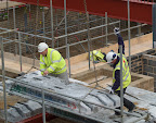 November 28th 2008 Danger men at work! The floor goes in to the new build