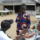  &ndash; Buying roasted groundnuts (peanuts) at Lumley Beach…. © 2007 NHA Photos