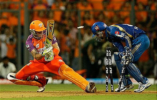 [Kochi Tuskers Kerala's Brendon McCullum looks back to see himself being bowled out by Mumbai Indians' Lasith Malinga[4].jpg]