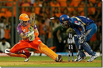 Kochi Tuskers Kerala's Brendon McCullum looks back to see himself being bowled out by Mumbai Indians' Lasith Malinga