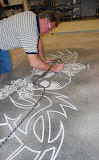concrete_staining_custom_logo_engraving.jpg