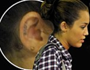 Miley Cyrus Gets a New LOVE Tattoo On her Right Ear