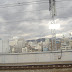 From the train. This is Himeji. The castle is in the back (hard to see)