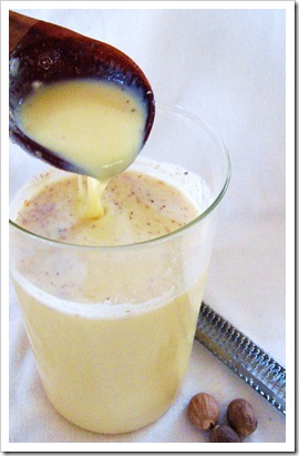 pitcher of eggnog with nutmeg