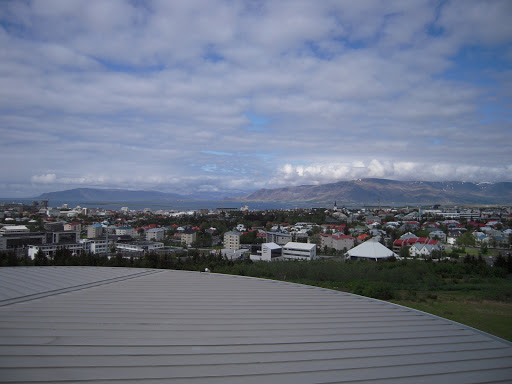 Looking north towards Esja from the Perlan's viewing deck. That grey thing below contains boiling hot geothermal water.