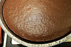 Run knife along edge to lift cake away from pan to prevent cracking