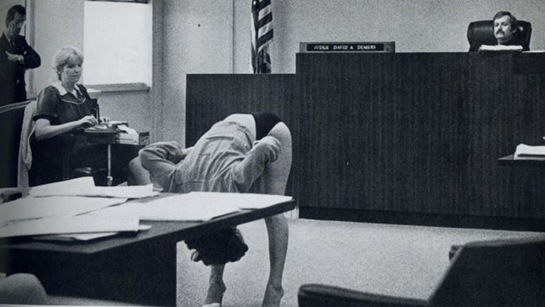 [lady bending over in court room[3].jpg]