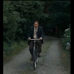 nic cage on a bike