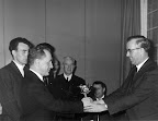 Winners of the Dumfries First Aid competition involving all companies including the Fire Service and the Police. - Jimmy Addison presentating the cup to Alec Hogg, Jim McCartney, Lindsay Graham (behind Alec) Jimmy Gilpin, Frank Heaton & Bruce Bower