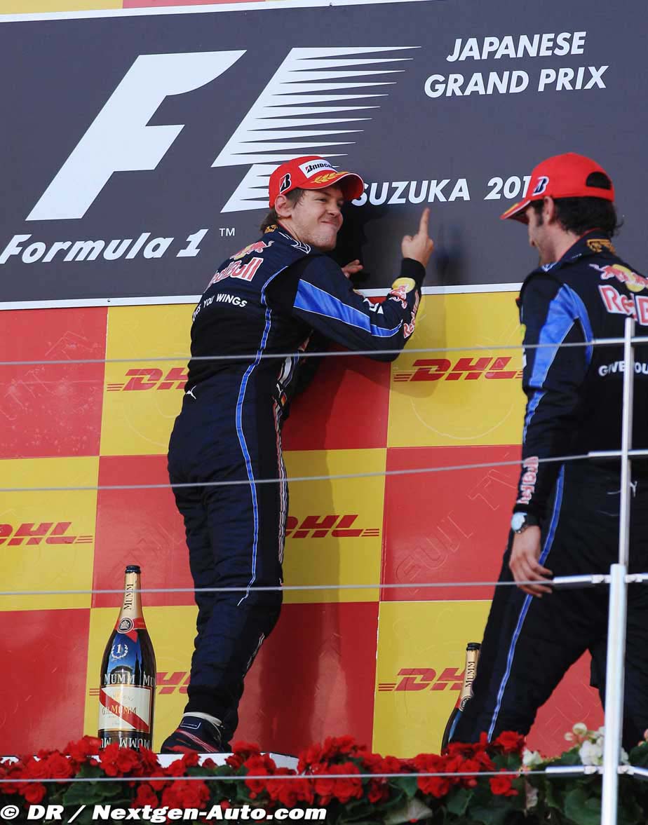 Себастьян Феттель и Марк Уэббер на подиуме Гран-при Японии 2010