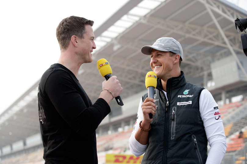 Ральф Шумахер берет интервью у Михаэля Шумахера для RTL на Гран-при Кореи 2010