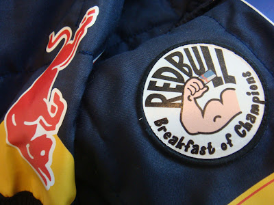 нашивка Red Bull Завтрак Чемпионов на Гран-при Абу-Даби 2010