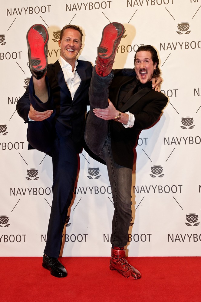 Michael Schumacher and Creative Director Navyboot Adrien J. Margelist arrive at the red carpet for the Navyboot Msone Collection launch at MoCa
