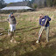 Katie demonstrating how to plant