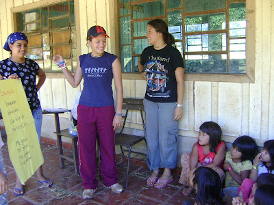 Rocío and Jazmín teaching a song