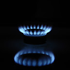 Blue flames of gas stove in the dark Blue flames of gas stove in the dark