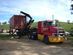 Loading 10t container onto side loader transport at One Tree Hill, Adelaide, South Australia