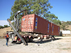 Delivery of empty shipping containers to One Tree Hill in January 2006