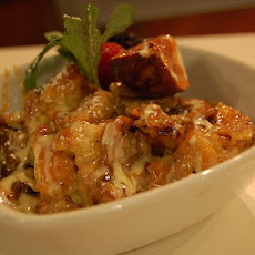 Layered Almond-Cream Cheese Bread Pudding with Amaretto Cream Sauce
