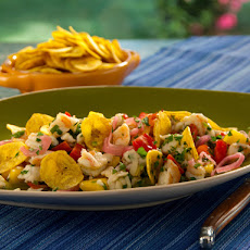 Ceviche (Shrimp and Grouper) with Serrano Chiles, Mango, Smoked Tomatoes, Crispy Plantain Chips