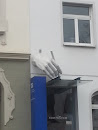 Hand Out of Wall