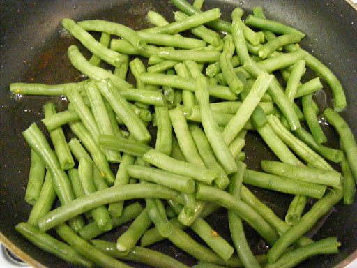 Saute the steamed green beans in bacon drippings.