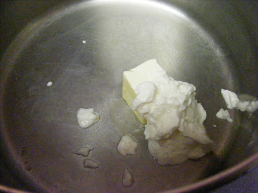 Add butter and sour cream to the pan.