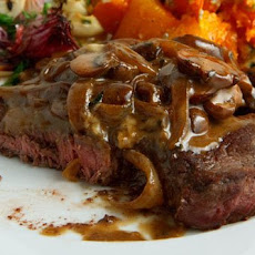 Rib-Eye Steaks with Mushrooms, Brandy and Blue Cheese