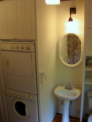 Stacking washer dryer in the bathroom