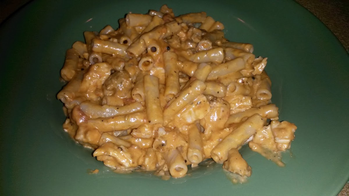 GF penne pasta with chicken and spicy Italian sausage in a tomato cream sauce.  very flavorful!