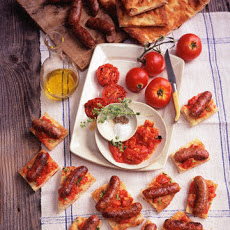 Grilled Italian Sausages and Tomatoes on Focaccia