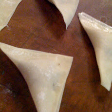 Mushroom Consommé with Shiitake and Cremini Ravioli