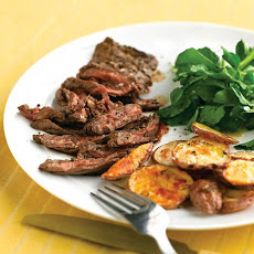 Skirt Steak with Crispy Garlic Potatoes