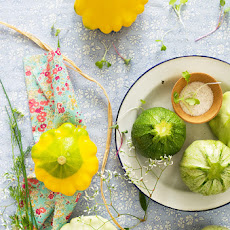 Globe zucchini stuffed with millet and vegetables