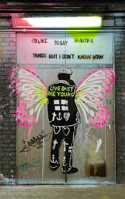 Stencil art and grafitti in Leake Street