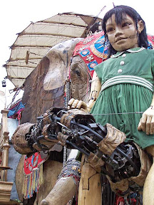 Elephant and girl looking very big