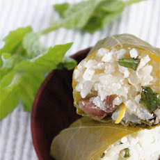 Grape leaves with goat cheese, olives, raisins, and mint