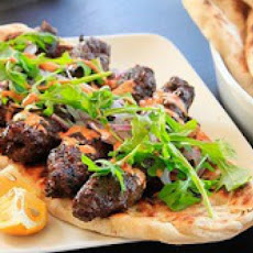 Kofte Kebabs with Spicy Harissa Yogurt Sauce and Grilled Flatbread (Minced Lamb Kebabs)