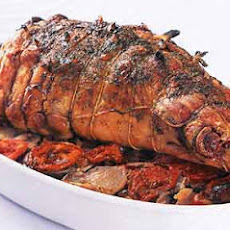 Leg of Roasted Lamb on Potato, Eggplant, and Tomato Tian