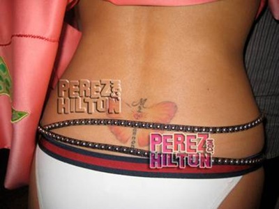 sexy girl wuth design Pink Star Tattoo lower back