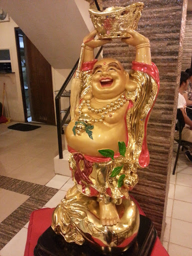 Gold Smiling Buddha Statue