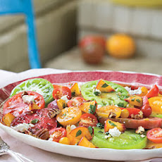 Heirloom Tomatoes with Fresh Peaches, Goat Cheese, and Pecans