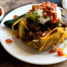 Carne asada stuffed potatoes