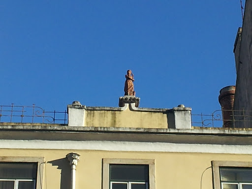 Statue on Building Top