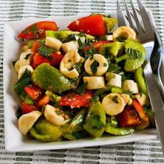 Colorful Tomato Salad with Hearts of Palm, Mint, and Spicy Thai Dressing