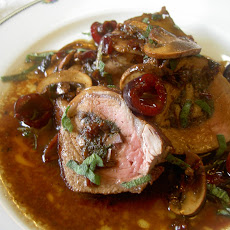 Cherry & Swiss Chard Stuffed Pork Tenderloin with a Cherry Sage Sauce