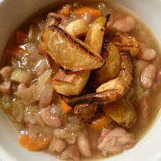 Bean and ham stew with roasted vegetable garnish