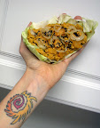 Cabbage boat filled with nut/veggie pate and topped with marinated/dehydrated onions and squash plus black sesame seeds. SO GOOD.